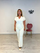 Conjunto de punto jersey pantalón recto con goma en la cintura beis