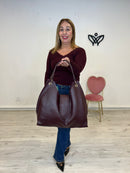 Bolso polipiel media luna burdeos