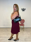 Bolso cartera alargado polipiel brillo asa doradas negro