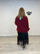 Jersey de punto escote en pico en burdeos