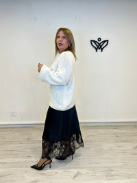 Jersey de punto escote en pico en beis