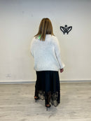 Jersey de punto escote en pico en beis