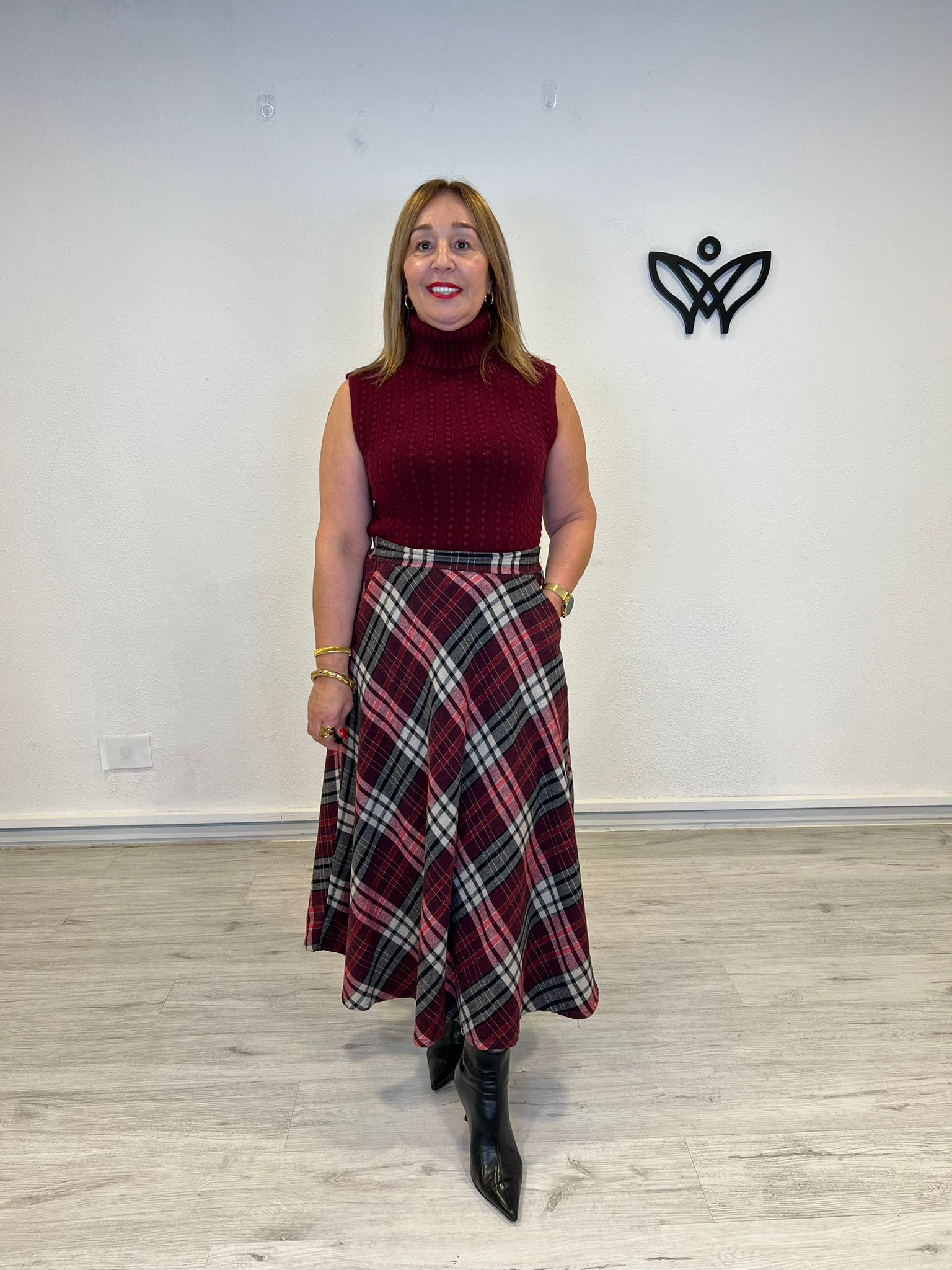 Jersey de punto de cuello subido sin mangas en burdeos