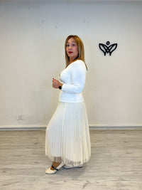 Camiseta top de licra manga larga escote en pico beis