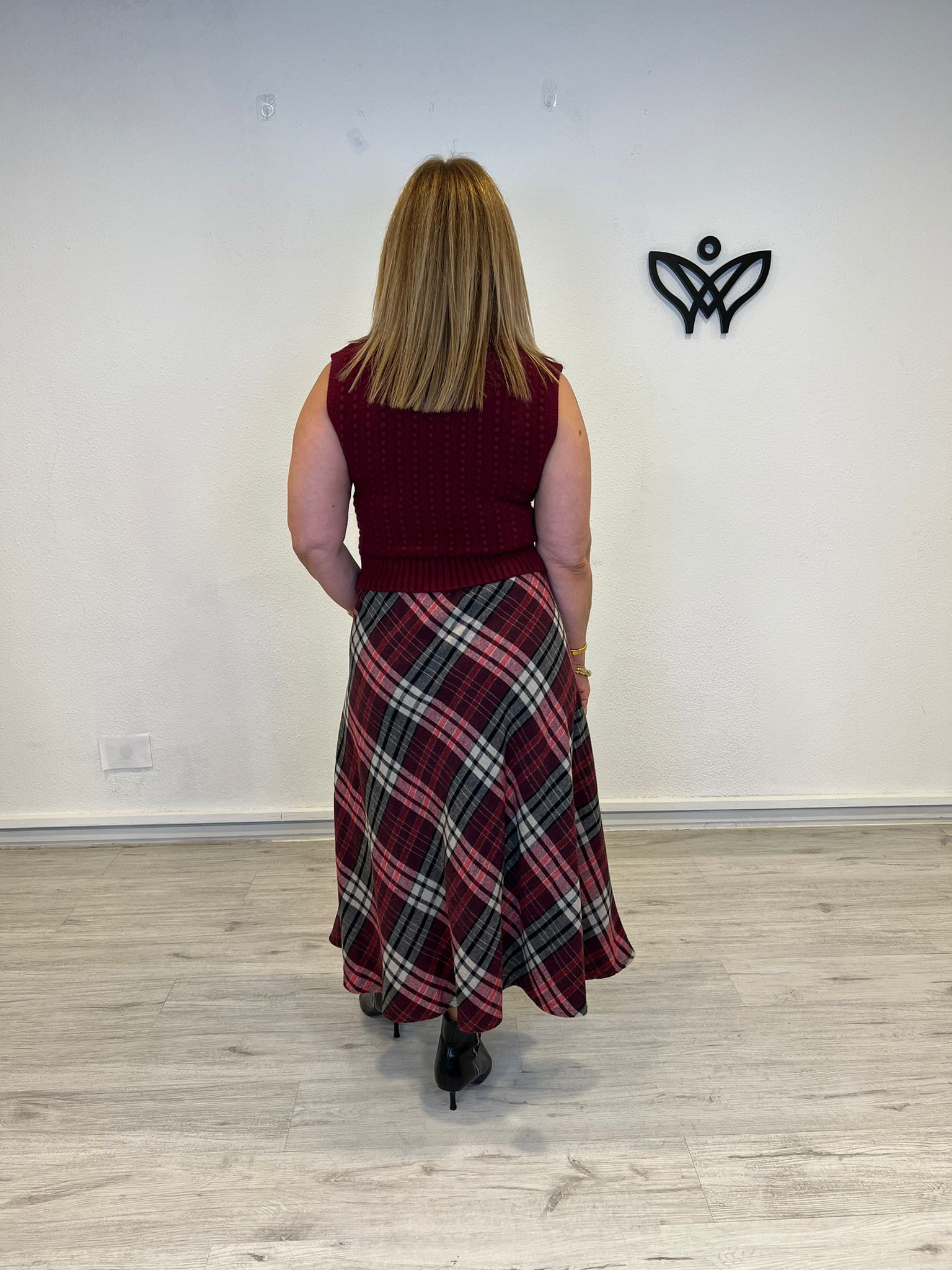 Jersey de punto de cuello subido sin mangas en burdeos