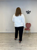 Chaqueta corta de pelo sintético forrada con botones en blanco