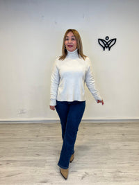 Jersey de punto largo de cuello subido beis