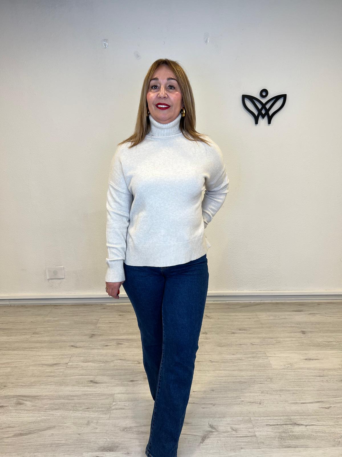 Jersey de punto largo de cuello subido beis