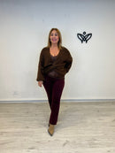 Jersey de punto escote en pico con nudo marrón chocolate