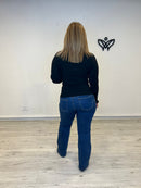 Jersey de punto cuello redondo con volantes discreto en negro