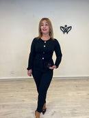 Camiseta con puntilla detalle de los botones en dorado cuello redondo manga larga negra