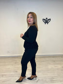 Camiseta con puntilla detalle de los botones en dorado cuello redondo manga larga negra