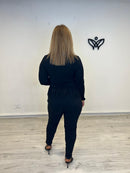 Camiseta con puntilla detalle de los botones en dorado cuello redondo manga larga negra