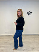 Camiseta básica con escote en pico y encaje en los puños y escote en negro