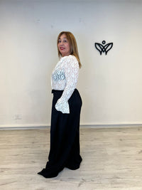 Pantalón largo de pinzas con bolsillos recto negro