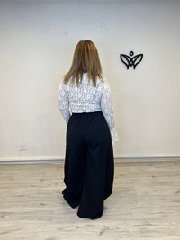 Pantalón largo de pinzas con bolsillos recto negro