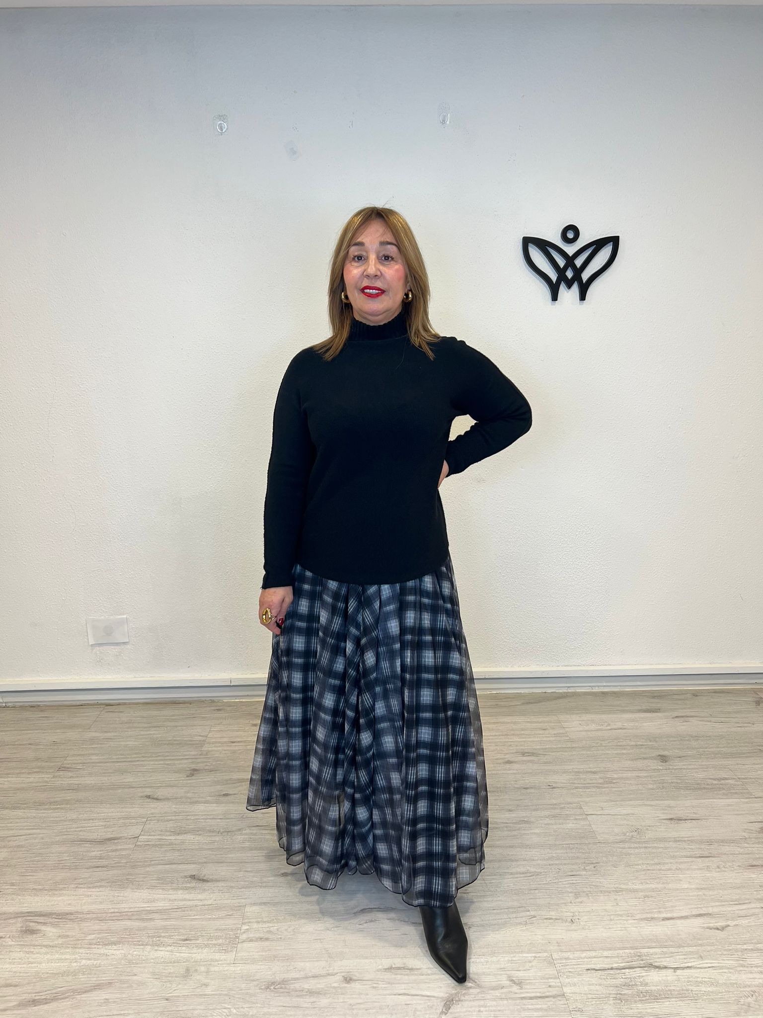 Jersey de punto fino negro cuello perkin