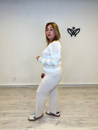 Conjunto de punto pantalón y jersey de rayas beis