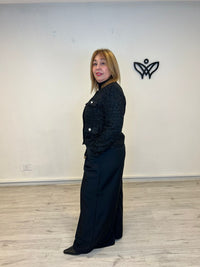 Chaqueta chanelita con botones de perlas en negro