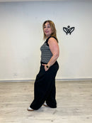 Top de punto negro con rayas blancas