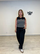 Top de punto negro con rayas blancas