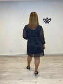 Vestido corto de lunares con escote en pico negro