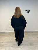 Cazadora vaquera negra estilo bomber