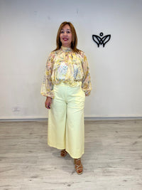 Pantalón midi bolsillos amarillo