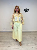 Pantalón midi bolsillos amarillo