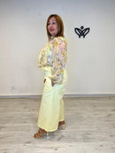 Pantalón midi bolsillos amarillo