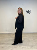 Camisa de gasa negra fluida con lazada
