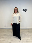 Camisa de gasa beige fluida con lazada