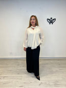 Camisa de gasa beige fluida con lazada