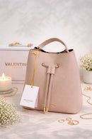 Bolso Valentino bombonera beige piel
