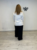 Americana beige cruzada con hombreras