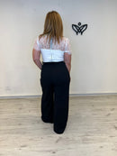 Mono blanco y negro palazzo con encaje elegante
