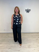 Top satinado lunares negro