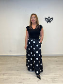 Pantalón satinado negro con lunares corte palazzo
