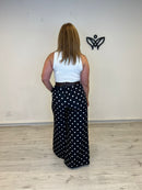 Pantalón palazzo negro con lunares blancos satinado
