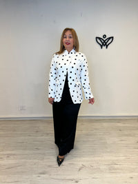 Americana blanca de lunares negra elegante