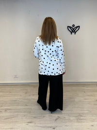 Americana blanca de lunares negra elegante