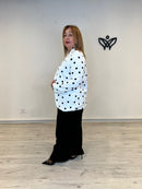 Americana blanca de lunares negra elegante