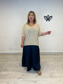 Jersey crochet dorado escote pico fluido