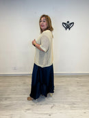 Jersey crochet dorado escote pico fluido