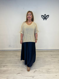 Jersey crochet dorado escote pico fluido