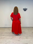 Vestido largo rojo con escote en pico, manga corta y bolsillos