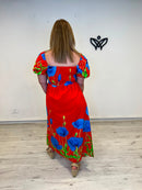 Vestido largo estampado con mangas abullonadas y escote nido de abeja