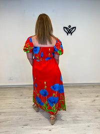 Vestido largo estampado con mangas abullonadas y escote nido de abeja