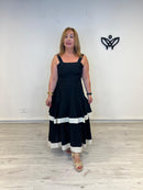 Vestido largo negro con detalle beige de tirantes