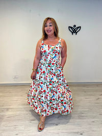 Vestido midi de algodón estampado de flores con bolsillos